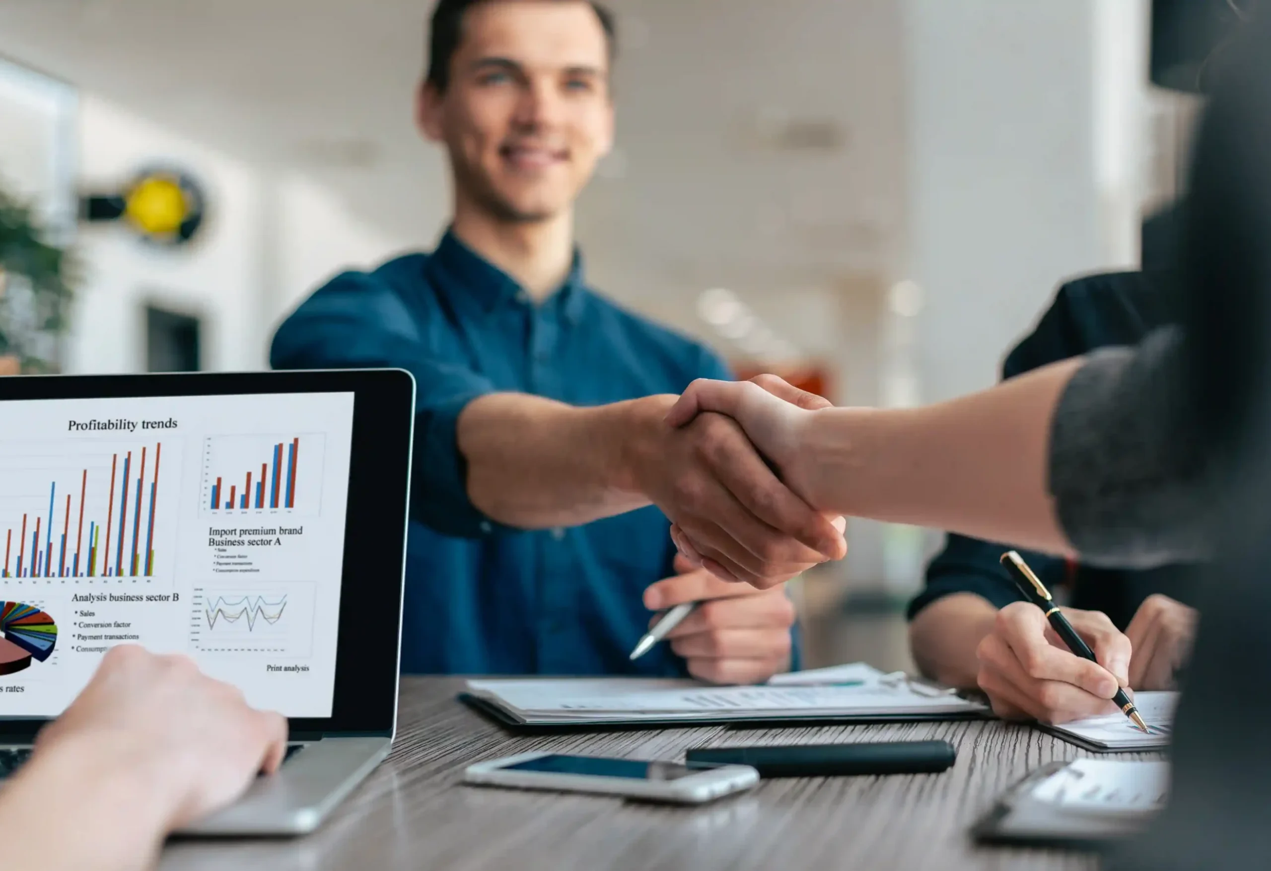 close-up-young-people-greeting-each-other-work-table (1)_11zon